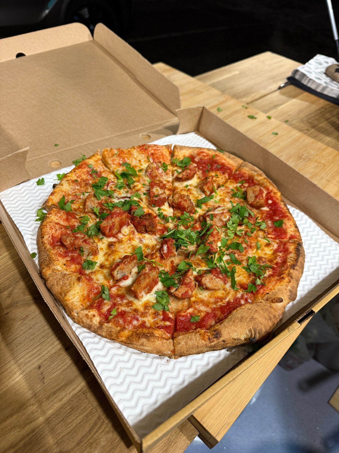 Freshly baked Pizza Levio pizza with parsley